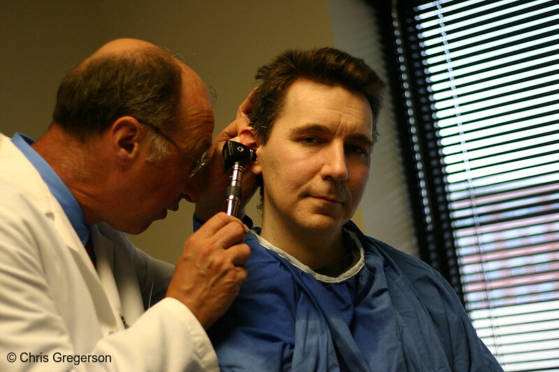 Photo of Doctor Examining a Patient's Ear(6647)