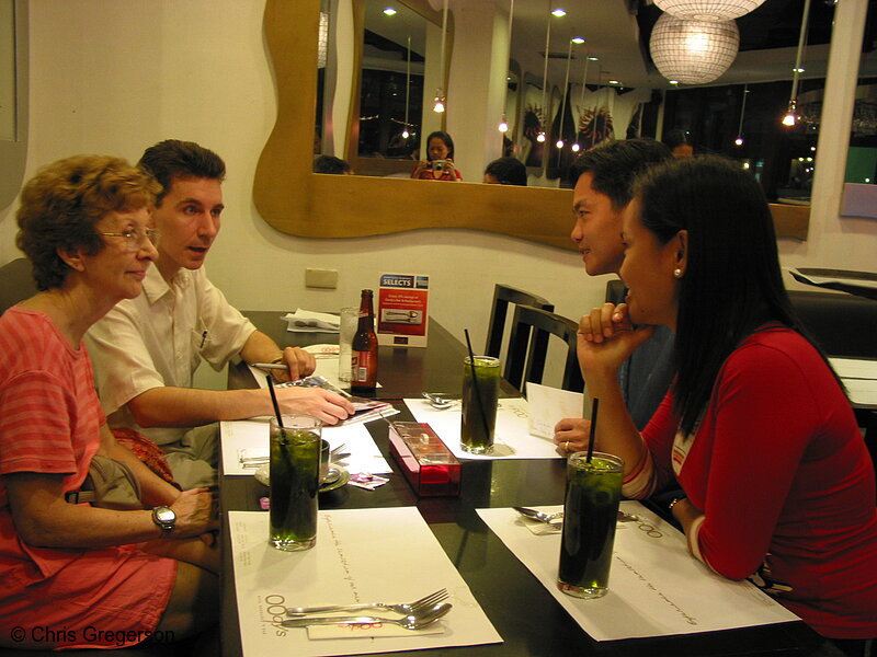 Photo of Chris Gregerson and Mother having dinner with in-laws-to-be in Manila.(7807)