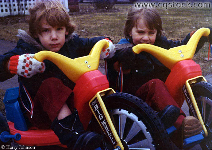 Photo of Littel Kids (Brothers) on their Big Wheels(1282)