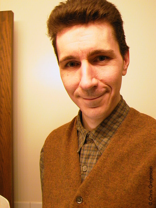 Portrait of Man in Sweater-Vest