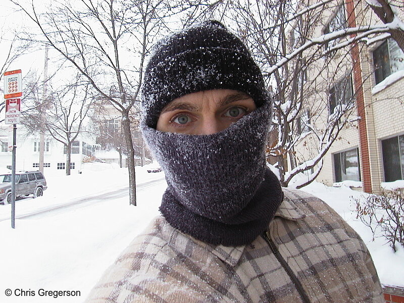 Photo of Close-Up of Man in Hat, Scarf After a Snowstorm(1411)