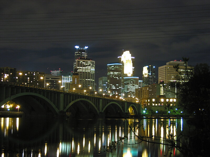 Photo of Bridge, River, and Downtown Minneapolis Skyline at Night(1953)