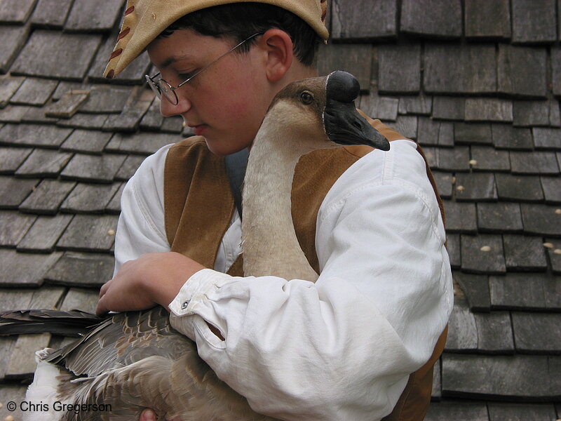 Photo of Teenage Boy in Costume Holding a Goose(2368)