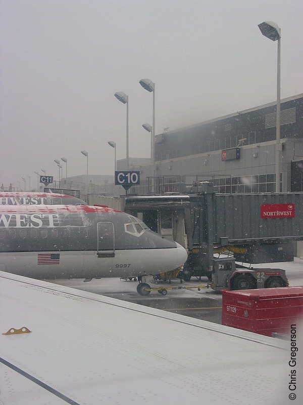 Photo of Airplanes at Terminal Gates in Winter(2779)