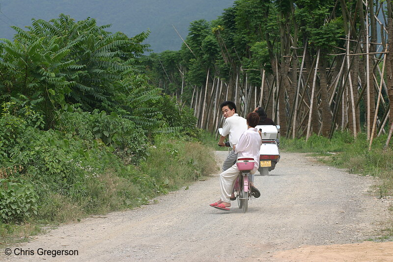 Photo of Couple on Scooter in Rural China(3270)