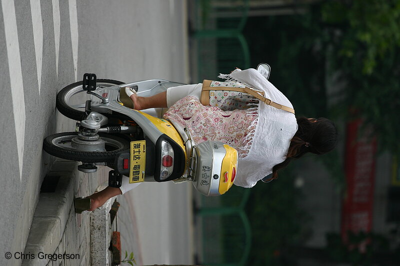 Photo of Young Woman on a Motorbike(3394)