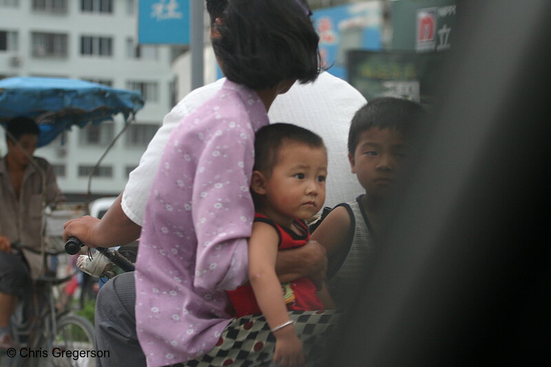 Photo of Family Riding in a Bike Wagon, China(3443)