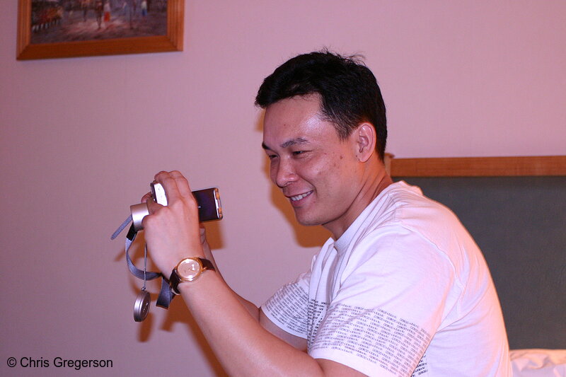 Photo of Chinese Man with Digital Camera(4206)
