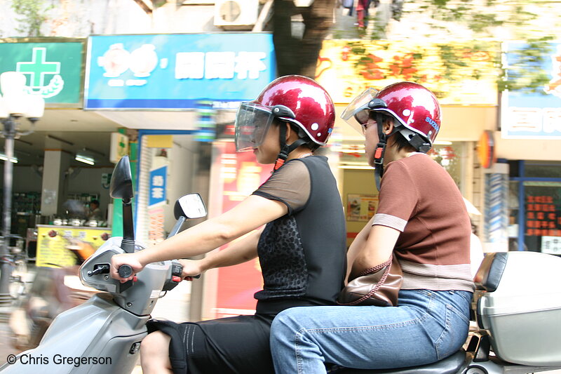Photo of Women on a Scooter in China(4239)