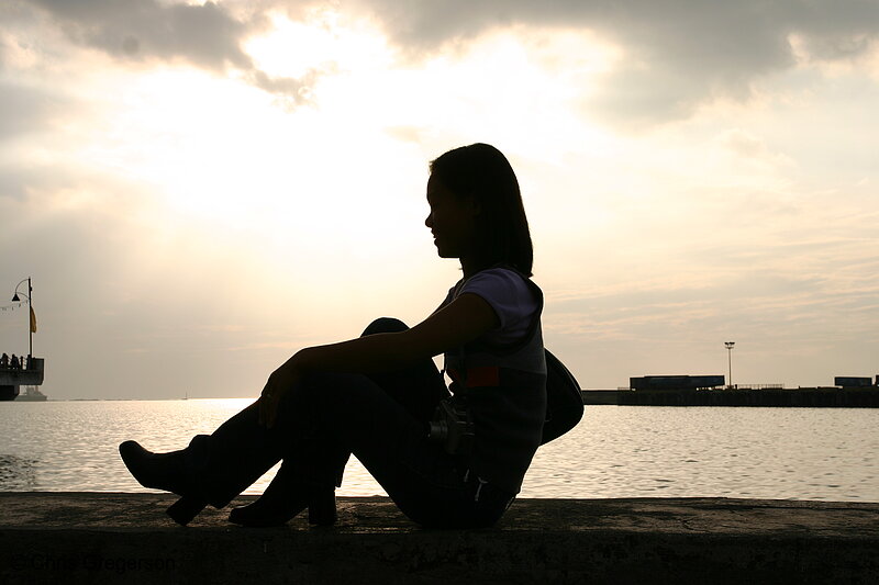 Photo of Female Profile Against the Ocean Sunset(4434)