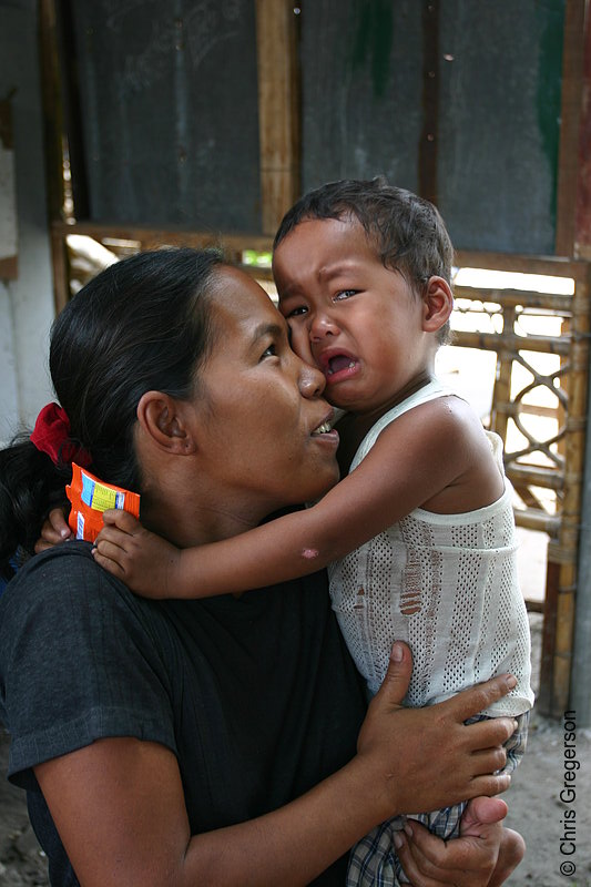 Photo of Mother and Frightened (Crying) Child, Philippines(4653)