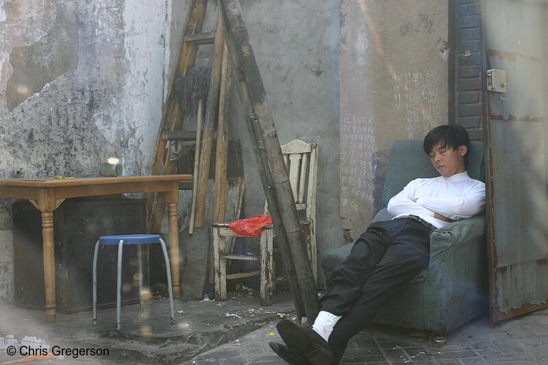 Photo of Man Sleeping in a Beijing Hutong in an Armchair(5164)