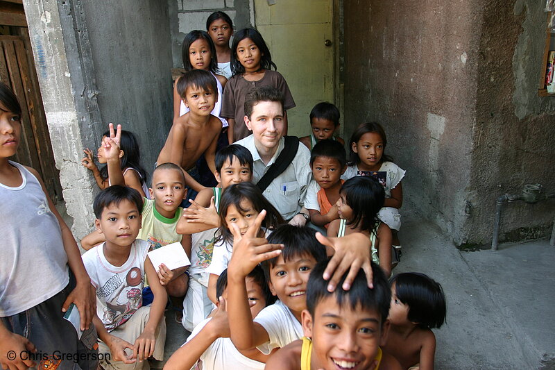 Photo of Chris Amidst the Poor Children in Balibago, Angeles, Pampanga, Philippines(5374)
