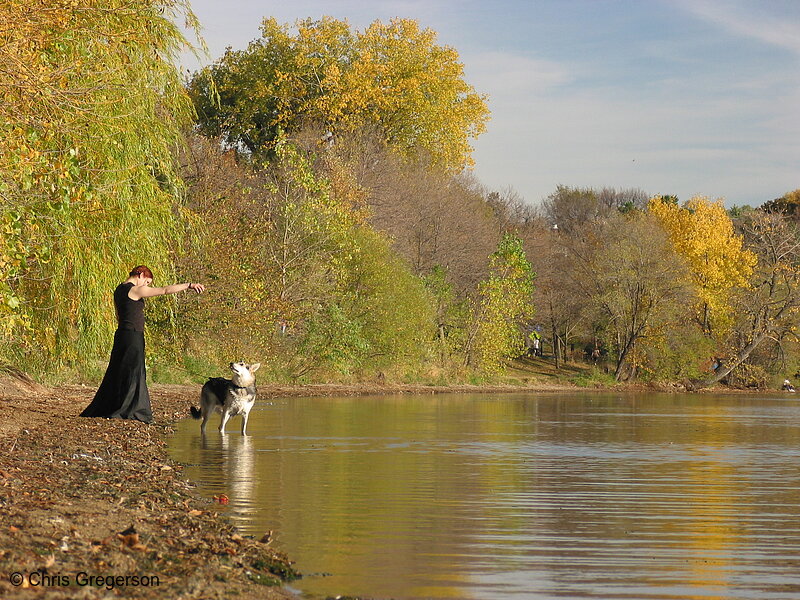 Photo of Young Woman and Dog on the Lakeshore in Fall(5452)