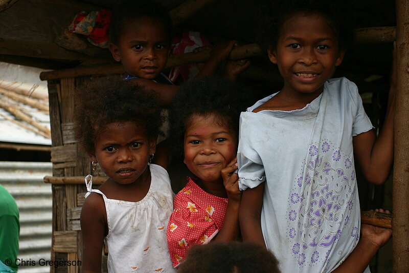Photo of Aeta Girls Standing by a Nipa Hut(5993)
