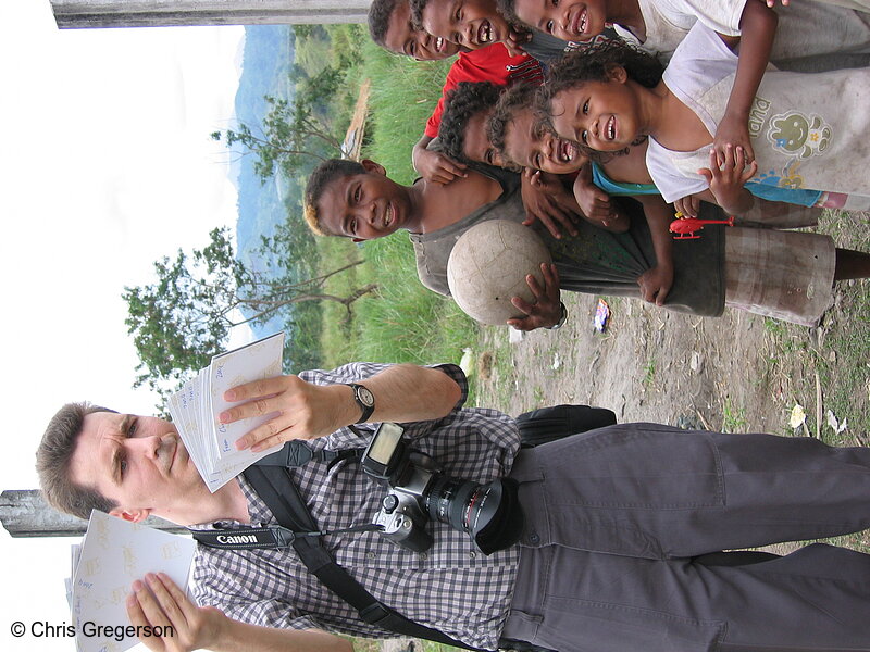 Photo of Photographer Showing Photos to Aeta Children in Pampanga(6012)