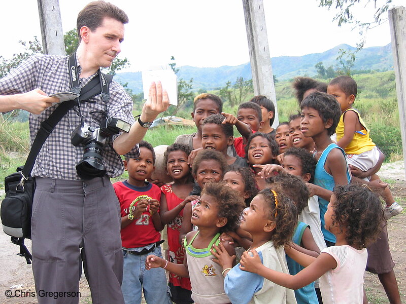 Photo of Photographer Distributing Photos in Aeta Village(6013)