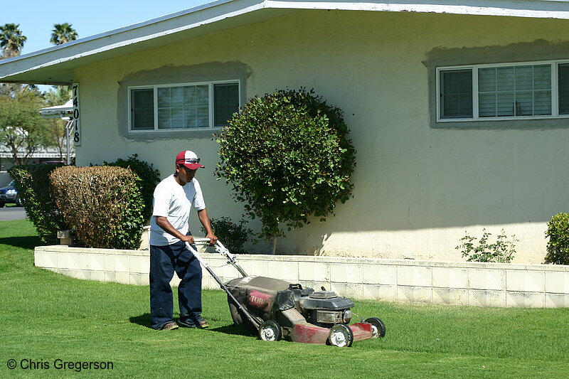 Photo of Man Mowing Yard/Residential Lawn(6434)