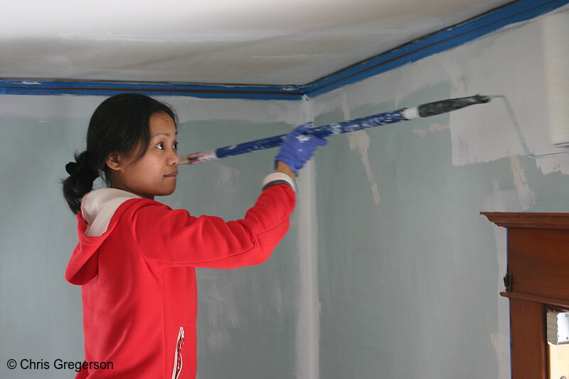 Photo of Woman Painting Bedroom with Roller(6898)