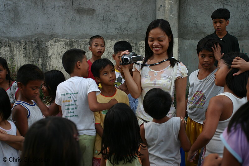 Photo of Arlene Surrounded by Children in Diamond Subdivision(6928)