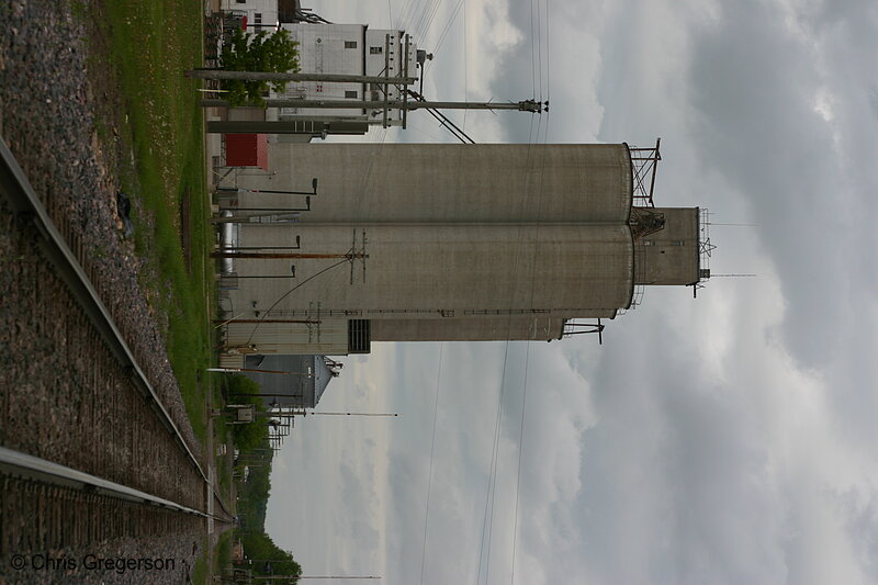 Photo of Grain Elevator next to Railroad Tracks(7018)