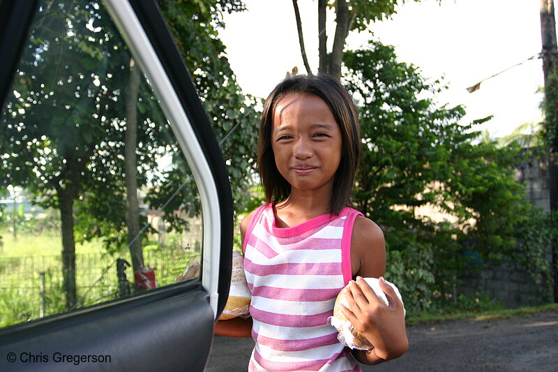 Photo of Girl Selling Fruit by the Road, Philippines(7391)