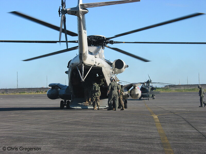 Photo of Marines Boarding a CH-53 Sea Stallion, Clark Air Base, the Philippines(7518)