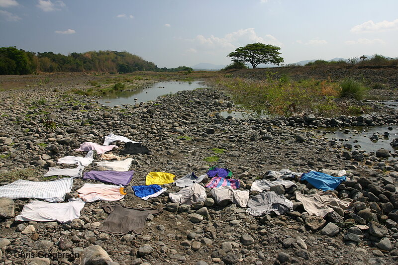 Photo of Clothes Drying on the Badoc Riverbed(7670)