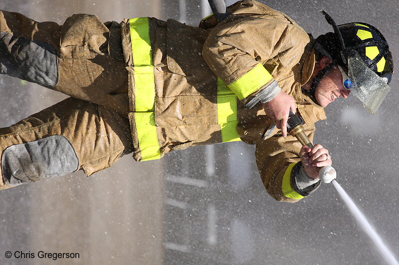 Photo of Fire Fighter with Water Hose(7778)