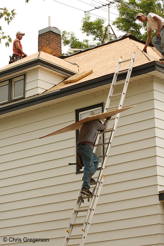 Roofers Replacing Residential Roof