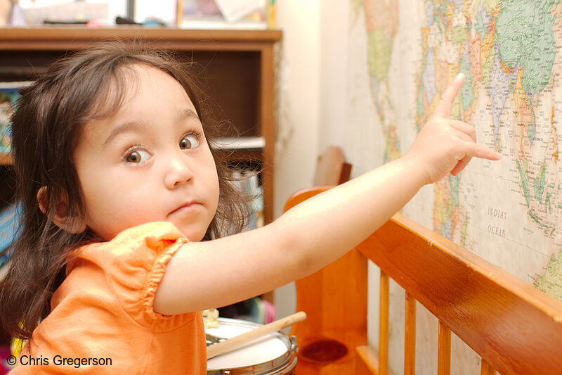 Photo of Preschool Girl Pointing to the Philippines on a World Map(8231)